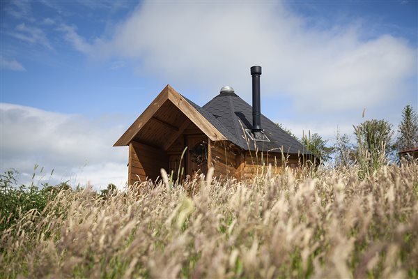 Romantic woodland log cabin remote